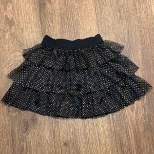Girls 4T black with gold polka dots ruffled skirt.